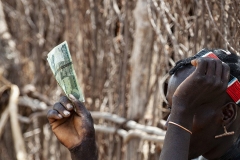 Hand and Money Omo Valley Ethiopia